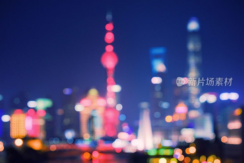 Beautiful modern city at night in Shanghai out of focus